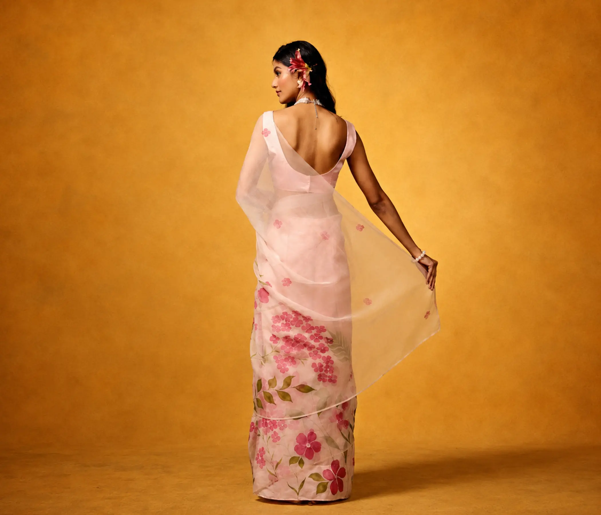 Hand-Painted Blush Pink Organza Saree with Floral Artwork